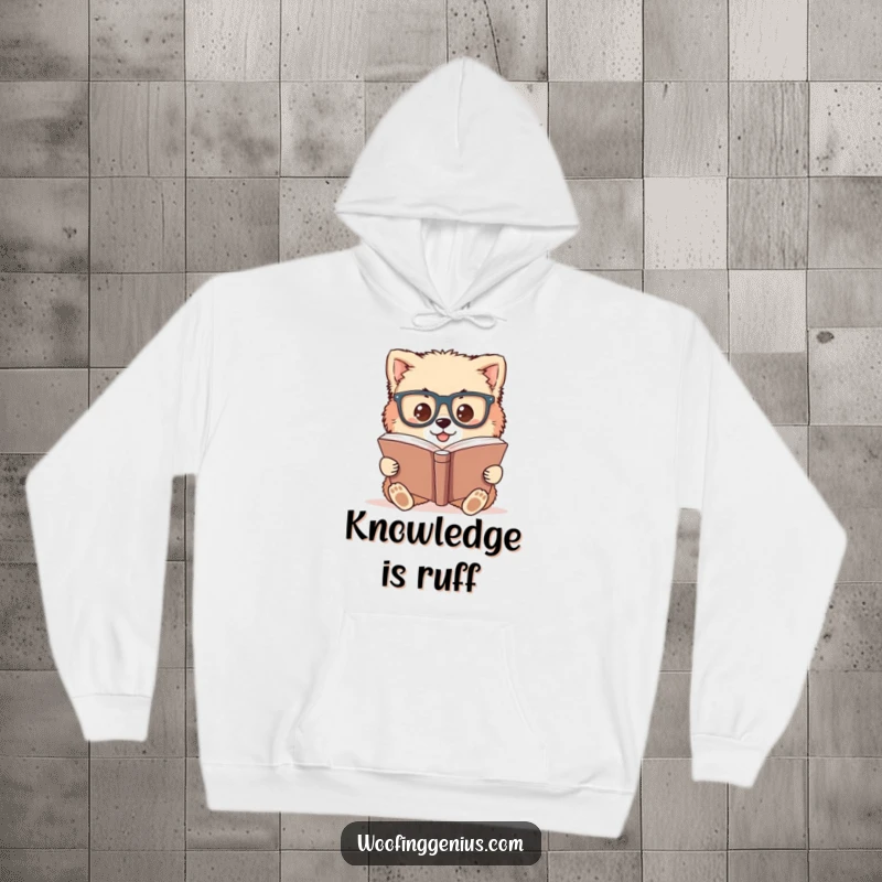 Funny hoodie showing a fluffy dog with oversized glasses intently reading a large book.